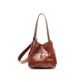 Brown genuine leather woven bucket bag, stylish large capacity shoulder handbag for women. - Pumpkin Orange