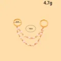 Doppelter Fingerring mit rosa Perlenkette, goldfarbenes Legierung schickes Modeschmuckteil - Rosa Künstliche Perle