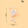 Silberner verstellbarer Kristall Blumenring mit hängenden Ketten im trendigen minimalistischen Stil. - Blumen Quaste Offener Ring / Gold