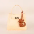 Light yellow leather handbag with cute cat pendant and metal lock, elegant daily women bag. - BHT07 Brown Kitten