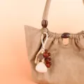 Natural plant seed pod bag charm detail, handmade wooden bead wind chime pendant. - Symmetrical Black (07)