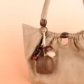 Handcrafted natural seed shell wind chime bag pendant, healing forest style hanging accessory. - 08
