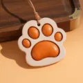 Cute leather cat paw car rearview mirror pendant and bag charm accessory in orange and beige. - Orange