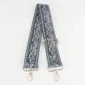 Tracolla per borsa larga regolabile grigia con motivo Paisley e dettagli metallici dorati. - Paisley Grigio