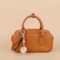 Brown structured boston handbag featuring a chic handmade braided knot bag charm accessory. - SJQ22 Green - Silver Buckle
