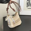 Handmade crochet woven crossbody shoulder bag for women with pearl bow strap, stylish mini casual purse. - With Charm / Beige and Khaki