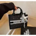 Black star print canvas tote bag with fashion letter print and silver star pendant for women - With Charm / Black