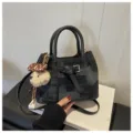 Stylish women shoulder crossbody bucket bag with cute dog pendant, dark patterned design - With Charm / Black