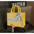 Yellow canvas tote bag for women with star pattern, fashion handbag with cute star charm. - With Charm / Yellow