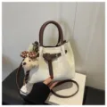 Stylish canvas bucket bag with brown handle and cute puppy pendant for women casual daily. - With Charm / White