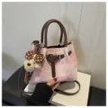 Pink bucket bag for women with brown handles and cute puppy charm, stylish shoulder crossbody bag. - With Charm / Pink