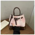 Stylish pink plaid canvas women bucket bag with brown leather handle and crossbody strap design. - No Pendant / Pink