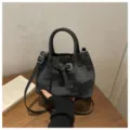 Fashionable women's bucket bag, chic canvas shoulder crossbody bag with top handle. - No Pendant / Black