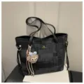 Stylish black pattern bucket bag with cute plush bear pendant, casual single shoulder tote bag. - With Charm / Black
