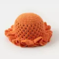 Detailed view of orange handmade crochet bucket hat with hollow-out design and cute ruffles. - L (58-60cm) / Orange