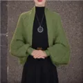 Green knit batwing cardigan detail view, showing grid pattern texture and loose drape style. - Army Green
