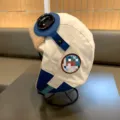 Detailansicht der Kinder Pilotenmütze mit Schutzbrille, winterwarmes Fleece-Futter. - Kopfumfang 50-55cm (Referenz 4-13 Jahre) / Beiges Stern Bär Flieger
