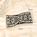 Fascia in maglia nera e bianca con design intrecciato e accogliente motivo geometrico invernale. - Fascia fiocco di neve - Nero