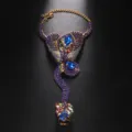 Exaggerierte Schlangen-Handkette mit blauen Strasssteinen für modebewusste Partys. - Gold Blauer Edelstein Armband