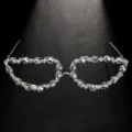 Closeup details of the sparkly rhinestone decorative glasses frame, perfect party accessory. - Silver