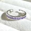 Close-up detail of a silver-tone open ring featuring purple square-cut crystal stones. - Purple Square Zirconia (JZ2179A) / Silver