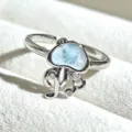 Silver open ring close-up featuring cute jellyfish design with light blue gem and sparkling stones. - Adjustable Open / Light Blue Jellyfish Style with Diamonds (JZ2278A) / Silver