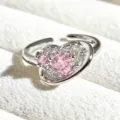 Close-up detail view of the sweet pink heart open ring featuring sparkling cubic zirconia stones. - Adjustable Open / Pink Heart Double Layer Zirconia Style (JZ2383A) / Silver