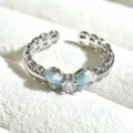 Close-up detail of a sweet enamel butterfly open ring with sparkling cubic zirconia stone. - Adjustable Open / Light Blue Enamel Butterfly (JZ3256A) / Silver