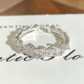 Detailed close-up shot of sparkling cubic zirconia adjustable open ring, exquisite design. - Vintage Wave Bowknot Style (JZ3888A) / Adjustable Open