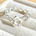 Exquisite white enamel camellia flower open silver ring featuring an elegant twisted band design - White Camellia Style (JZ1120A)