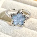 Closeup of the starry sky blue glitter adjustable ring, highlighting the detailed texture. - Blue Magic Star Style (JZ5121A)