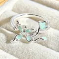 Close-up detail of silver enamel ring featuring mint green sparkle finish and delicate rhinestone. - Mint Green Shimmer Enamel Style (JZ5128B)