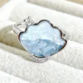 Exquisite detail shot of a sweet cloud shaped enamel ring with shimmering blue glitter stones. - Cloud Shell Rhinestone Style (JZ5403A)