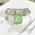 Anillo abierto de mariposa con circonita verde elegante para mujer, joya de dedo brillante. - Abierto Ajustable / Estilo De Mariposa De Circonia Verde Ovalada (JZ4547A)