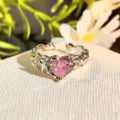 Close-up detail of silver open ring with pink heart zircon and floral carved band decor. - Adjustable Open / Pink Diamond Carved Style (JZ2298)