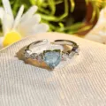 Close-up detail of stylish silver heart cubic zirconia open ring with sparkling crystal stones - Adjustable Open / Blue Diamond Side Accent Style (JZ3026A)