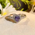 Close-up detail of the sparkling heart-shaped purple zirconia open ring with dainty micro-pave. - Adjustable Open / Purple Diamond Luxury Style (JZ3827)