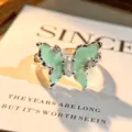 Mintgrüner Schmetterlingsring aus Emailliertem Zirkon, elegantes offenes Design für Damen. - Mambo Schmetterling Stil (JZ1655A) / Einstellbar Offen