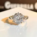 Impresionante anillo abierto plateado con circonitas brillantes para un look muy elegante. - Abierto Ajustable / Estilo de Flor Cruzada (JZ5074A) / Plateado