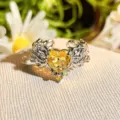 Close-up view of heart-shaped yellow zircon silver open ring with intricate floral details. - Adjustable Open / Yellow Diamond Vintage Carved (JZ5962)