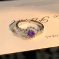 Detailed view of the flower-shaped open ring featuring a sparkling purple central zircon. - Classic Floral Style (JZ0081A) / Adjustable Open