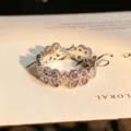Silver-tone open ring featuring purple zirconia stones in a delicate floral clover design. - Classic Clover Hollow Style (JZ5292A) / Adjustable Open