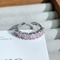 Close-up detail of the pink oval cubic zirconia open ring, showing delicate silver-tone band. - Oval Pink Zirconia Style (JZ4094) / Silver