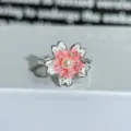 Close-up of enamel cherry blossom ring with pearl center, adjustable open band design. - Adjustable Open / Pink-White Pearl Flower Style (JZ0688A)