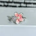 Silver cherry blossom open ring with pink enamel, central pearl, and sparkling cubic zirconia. - Adjustable Open / Pink Enamel Sakura Style (JZ2200B)