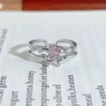 Silver double-layer open ring featuring a sparkling pink zircon and cute bow design for sweet styles. - Double Layer 3D Bowknot Style (JZ2948A)