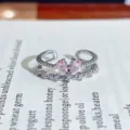 Silver adjustable open ring featuring pink zirconia stones in a cute bow and heart design. - Double Layer Heart Bowknot Style (JZ3997A)