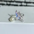 Close-up detail of silver open ring with pearl and colorful enamel butterfly zircon decor. - Adjustable Open / Pink-Blue Enamel Butterfly Pearl Style (JZ2769A)