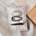 Detailed close-up of sweet and cool black silver polka dot hair clips set on card backing. - 6# Wide Water Drop / Straight Line Style / 4 Pieces/Pack