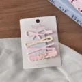 Detailed view of sweet pink hair clip set with cute bows and floral patterns, daily accessories. - Set of 4 / Pink Series Hollow Bowknot